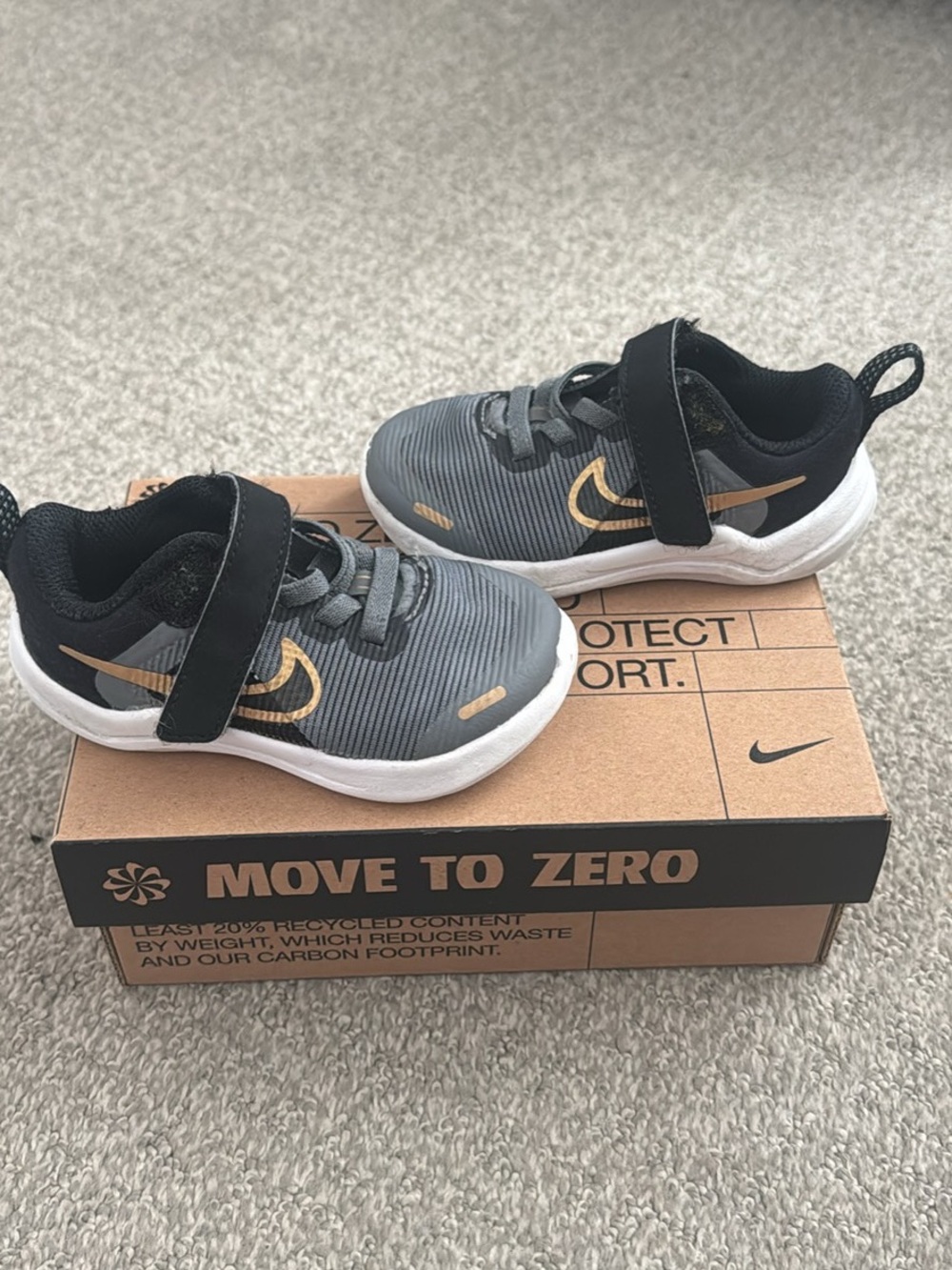 Nike Kids' Gray and Black Sneakers with Gold Swoosh 5c. Includes box